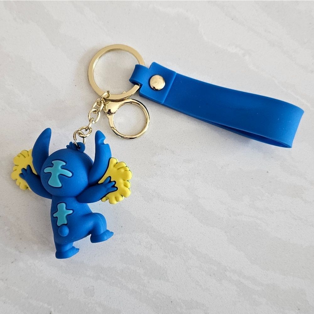 Stitch With Pom Poms Blue and Yellow Keychain Toy - Picture 3 of 5
